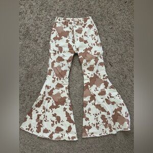 Worn once! Alter’d State Cow Print Flare jeans